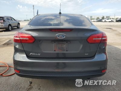 Zdjęcie 6 z 14 samochodu: 2017 FORD FOCUS SE VIN:1FADP3F24HL302060 - miniatura
