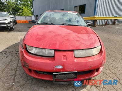 Piąte zdjęcie samochodu w środku: 1999 SATURN SC1 VIN:1G8ZP1287XZ243932 - miniatura