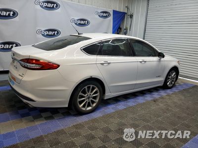 Trzecie zdjęcie samochodu z tyłu: 2017 FORD FUSION SE HYBRID VIN:3FA6P0LU1HR400705 - miniatura