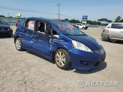 Czwarte zdjęcie samochodu z boku: 2010 HONDA FIT SPORT VIN:JHMGE8H46AS028119 - miniatura