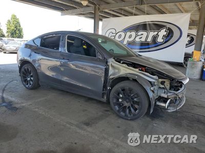 Czwarte zdjęcie samochodu z boku: 2022 TESLA MODEL Y VIN:7SAYGDEE4NF558374 - miniatura