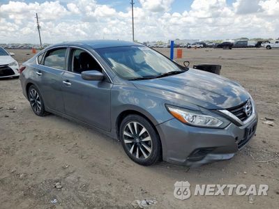 Czwarte zdjęcie samochodu z boku: 2018 NISSAN ALTIMA 2.5 VIN:1N4AL3AP0JC164766 - miniatura