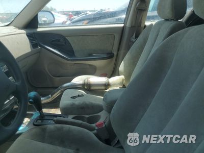 Zdjęcie 7 z 12 samochodu: 2002 HYUNDAI ELANTRA GLS VIN:KMHDN45D72U360511 - miniatura