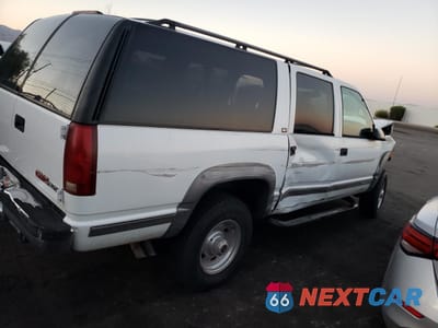 Trzecie zdjęcie samochodu z tyłu: 1996 GMC SUBURBAN K2500 VIN:1GKGK26J0TJ714332 - miniatura
