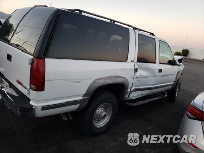 Trzecie zdjęcie samochodu z tyłu: 1996 GMC SUBURBAN K2500 VIN:1GKGK26J0TJ714332 - miniatura