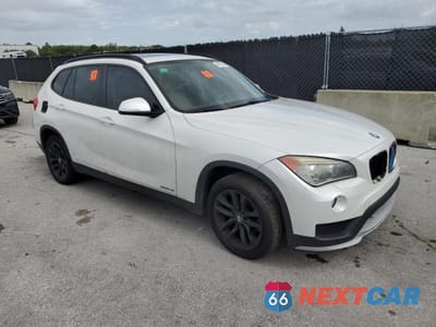 Czwarte zdjęcie samochodu z boku: 2015 BMW X1 XDRIVE28I VIN:WBAVL1C58FVY26050 - miniatura