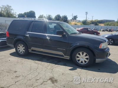 Czwarte zdjęcie samochodu z boku: 2003 LINCOLN NAVIGATOR VIN:5LMFU28R73LJ30317 - miniatura