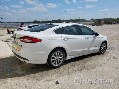 Trzecie zdjęcie samochodu z tyłu: 2017 FORD FUSION SE HYBRID VIN:3FA6P0LU1HR409002 - miniatura