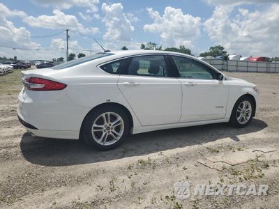 Trzecie zdjęcie samochodu z tyłu: 2018 FORD FUSION SE HYBRID VIN:3FA6P0LU8JR171980 - miniatura