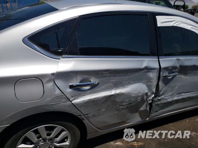 Zdjęcie 10 z 12 samochodu: 2018 NISSAN SENTRA S VIN:3N1AB7APXJY333660 - miniatura