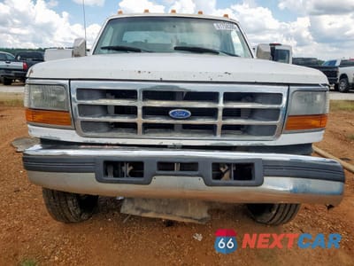 Piąte zdjęcie samochodu w środku: 1997 FORD F350 VIN:3FEKF37F4VMA67182 - miniatura