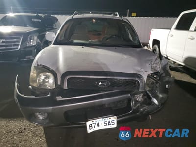 Piąte zdjęcie samochodu w środku: 2004 HYUNDAI SANTA FE GLS VIN:KM8SC13E84U713106 - miniatura