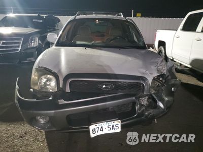 Piąte zdjęcie samochodu w środku: 2004 HYUNDAI SANTA FE GLS VIN:KM8SC13E84U713106 - miniatura