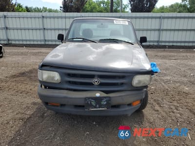 Piąte zdjęcie samochodu w środku: 1995 MAZDA B2300 VIN:4F4CR12A3STM15319 - miniatura