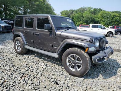 Czwarte zdjęcie samochodu z boku: 2019 JEEP WRANGLER UNLIMITED SAHARA VIN:1C4HJXEN3KW542920 - miniatura