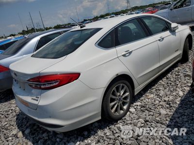 Trzecie zdjęcie samochodu z tyłu: 2017 FORD FUSION SE HYBRID VIN:3FA6P0LU7HR409246 - miniatura