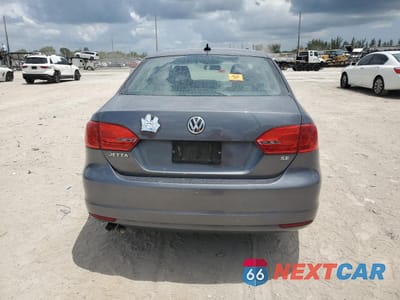 Zdjęcie 6 z 12 samochodu: 2005 VOLKSWAGEN JETTA SE VIN:3VWB07AJ6EM415835 - miniatura