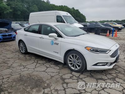 Czwarte zdjęcie samochodu z boku: 2017 FORD FUSION SE HYBRID VIN:3FA6P0LUXHR400721 - miniatura