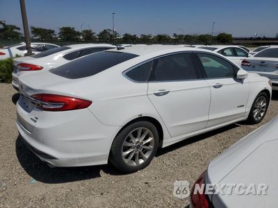 Trzecie zdjęcie samochodu z tyłu: 2017 FORD FUSION SE HYBRID VIN:3FA6P0LU8HR409174 - miniatura