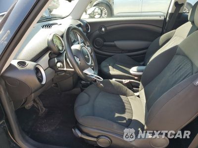 Zdjęcie 7 z 14 samochodu: 2009 MINI COOPER VIN:WMWMF33589TW73880 - miniatura