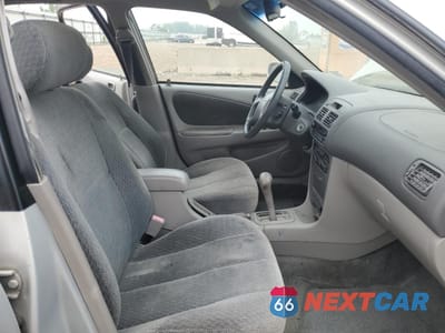 Zdjęcie 7 z 14 samochodu: 2001 TOYOTA COROLLA CE VIN:2T1BR12E21C434375 - miniatura