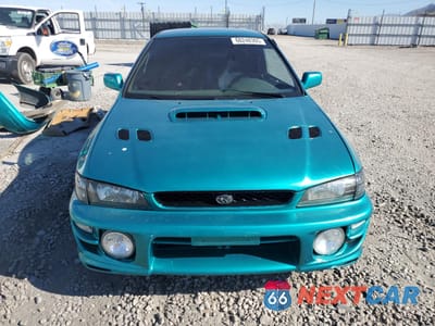 Piąte zdjęcie samochodu w środku: 1995 SUBARU IMPREZA L VIN:JF1GM2356SG406239 - miniatura