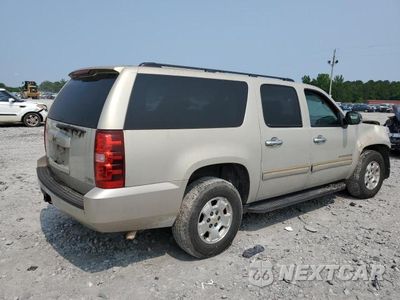 Trzecie zdjęcie samochodu z tyłu: 2010 CHEVROLET SUBURBAN C1500 LS VIN:1GNUCHE00AR127870 - miniatura