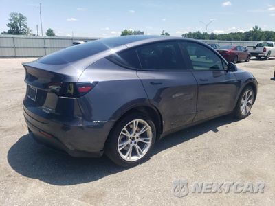 Trzecie zdjęcie samochodu z tyłu: 2022 TESLA MODEL Y VIN:7SAYGDEE7NF325573 - miniatura