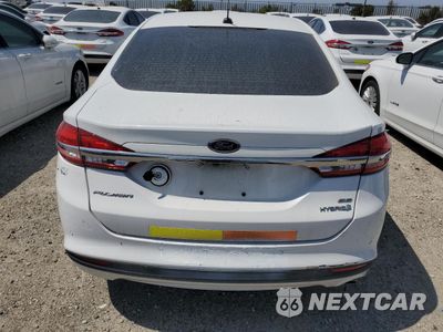Zdjęcie 6 z 12 samochodu: 2017 FORD FUSION SE HYBRID VIN:3FA6P0LU4HR359616 - miniatura