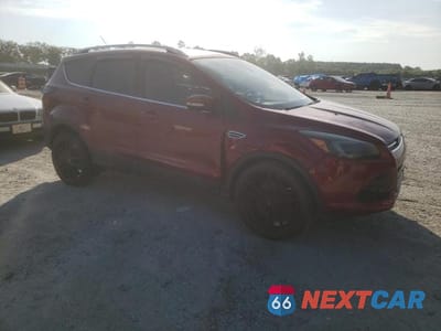 Czwarte zdjęcie samochodu z boku: 2015 FORD ESCAPE TITANIUM VIN:1FMCU0J97FUB89127 - miniatura