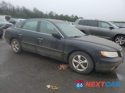 Czwarte zdjęcie samochodu z boku: 2006 HYUNDAI AZERA SE VIN:KMHFC46F26A070795 - miniatura