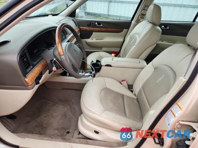 Zdjęcie 7 z 12 samochodu: 2000 LINCOLN CONTINENTAL VIN:1LNHM97V2YY764261 - miniatura