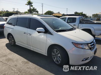 Czwarte zdjęcie samochodu z boku: 2014 HONDA ODYSSEY TOURING VIN:5FNRL5H93EB040399 - miniatura