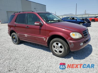 Czwarte zdjęcie samochodu z boku: 2002 MERCEDES-BENZ ML 320 VIN:4JGAB54E42A297266 - miniatura