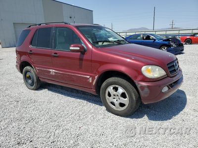 Czwarte zdjęcie samochodu z boku: 2002 MERCEDES-BENZ ML 320 VIN:4JGAB54E42A297266 - miniatura