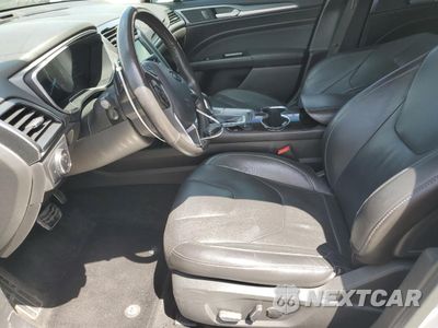Zdjęcie 7 z 14 samochodu: 2014 FORD FUSION TITANIUM VIN:3FA6P0K97ER267201 - miniatura