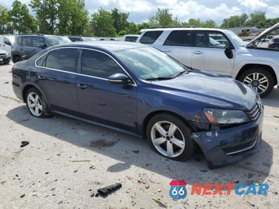 Czwarte zdjęcie samochodu z boku: 2012 VOLKSWAGEN PASSAT SE VIN:1VWBP7A37CC016010 - miniatura