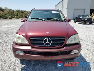 Piąte zdjęcie samochodu w środku: 2002 MERCEDES-BENZ ML 320 VIN:4JGAB54E42A297266 - miniatura