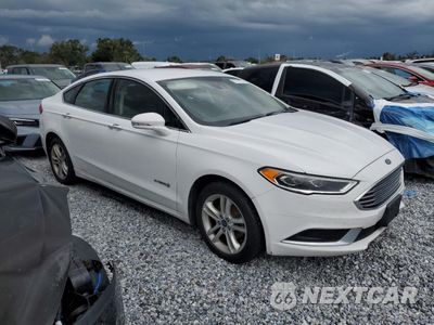 Czwarte zdjęcie samochodu z boku: 2018 FORD FUSION SE HYBRID VIN:3FA6P0LU8JR163507 - miniatura