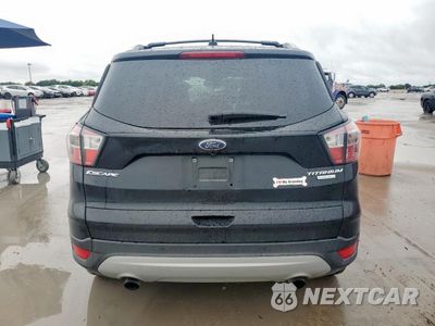 Zdjęcie 6 z 15 samochodu: 2017 FORD ESCAPE TITANIUM VIN:1FMCU0JDXHUD27928 - miniatura