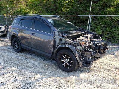 Czwarte zdjęcie samochodu z boku: 2018 TOYOTA RAV4 SE VIN:JTMJFREV3JJ201592 - miniatura