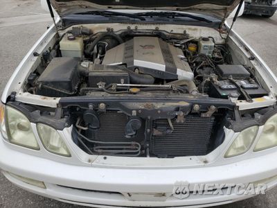 Zdjęcie 12 z 13 samochodu: 2003 LEXUS LX 470 VIN:JTJHT00WX33534413 - miniatura