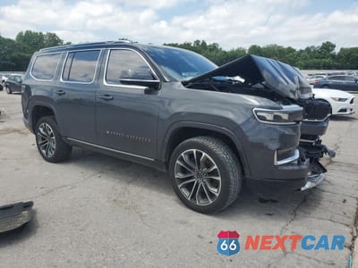 Czwarte zdjęcie samochodu z boku: 2022 JEEP GRAND WAGONEER SERIES III VIN:1C4SJVGJ0NS101584 - miniatura