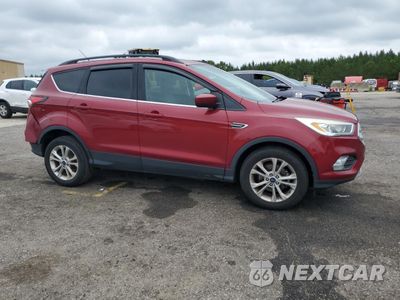 Czwarte zdjęcie samochodu z boku: 2017 FORD ESCAPE SE VIN:1FMCU0GD2HUA16372 - miniatura