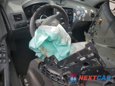 Zdjęcie 8 z 14 samochodu: 2006 HYUNDAI TUCSON GL VIN:KM8JM12B26U457662 - miniatura