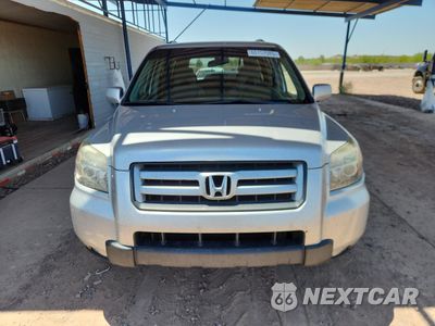 Piąte zdjęcie samochodu w środku: 2006 HONDA PILOT EX VIN:2HKYF18456H544830 - miniatura