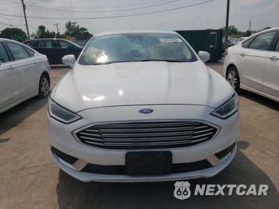 Piąte zdjęcie samochodu w środku: 2018 FORD FUSION SE HYBRID VIN:3FA6P0LU2JR129949 - miniatura