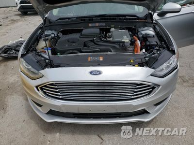 Zdjęcie 11 z 15 samochodu: 2018 FORD FUSION S HYBRID VIN:3FA6P0UU7JR100297 - miniatura