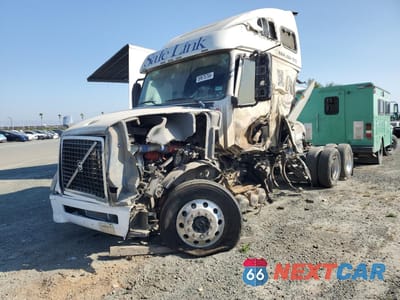 Drugie zdjęcie samochodu z przodu: 2012 VOLVO VN VNL VIN:4V4NC9TH9CN561487 - miniatura