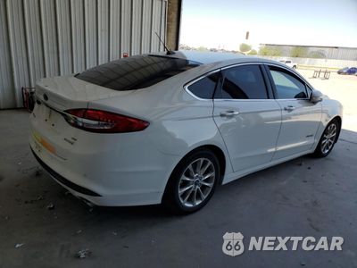 Trzecie zdjęcie samochodu z tyłu: 2017 FORD FUSION SE HYBRID VIN:3FA6P0LU0HR409170 - miniatura